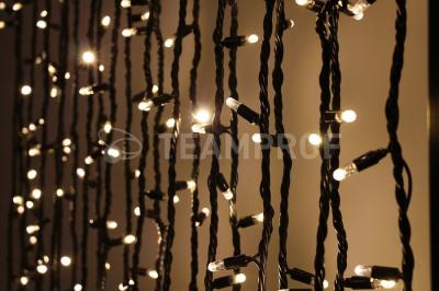 Светодиодная гирлянда нить Teamprof, 20м, 200 LED, 220В, динамика,  герм.колп, чер.провод, т.белый