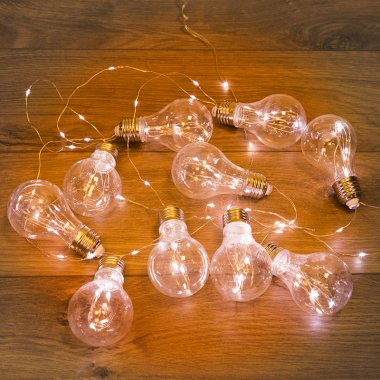 Гирлянда светодиодная Ретро-лампы Neon-Night 3 м, прозрач. ПВХ, IP20, 100 LED, т.белый, 3 х АА (нет)